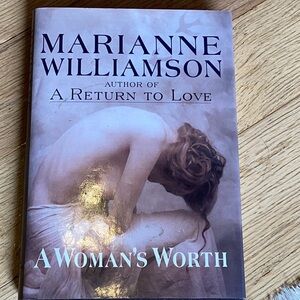 A Woman’s Worth hardback with paper cover by Marianne Williamson. Copyright 1993